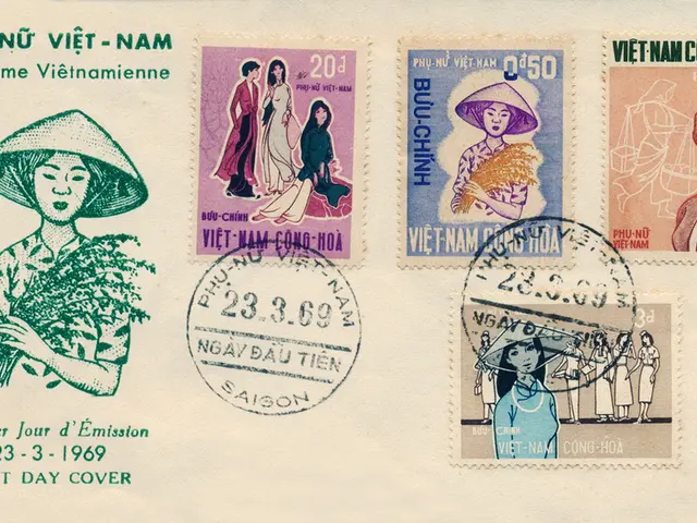 In this image I can see few postage stamps on the cream color surface and I can see an art of the...