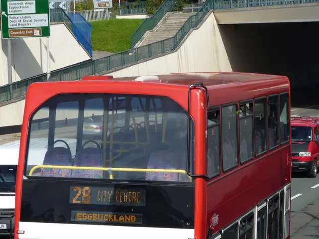 In the image we can see there are vehicles on the road. This is a road and white lines on the road....