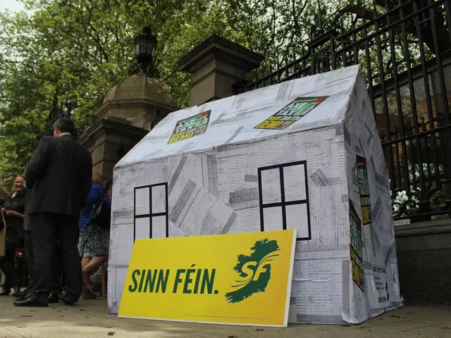 In the middle of the image we can see a tent placed on the floor and an advertisement board placed...