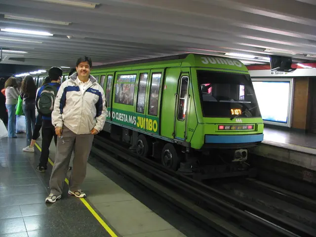There is a train on a railway track in the middle of this image. We can see people standing on the...