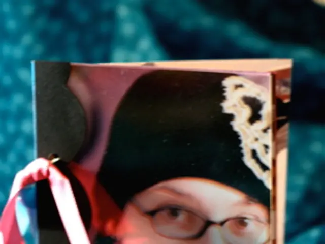 This image consists of a greeting card. On which there is a photo of a person along with the text....