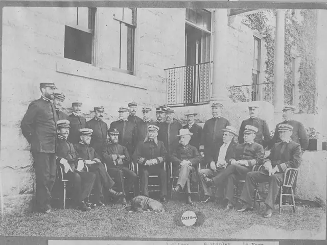 In the image in the center, we can see a few people are sitting on the chairs and few people are...