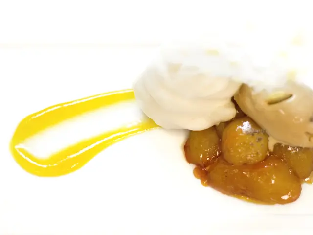 In this image we can see a dessert.