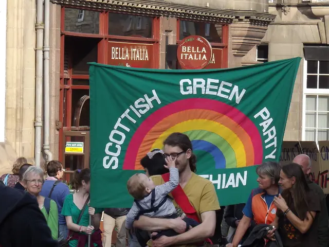 In the are many people around, they are wearing clothes and some of them are wearing spectacles....