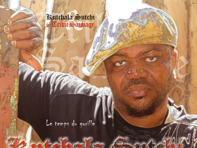 This is a poster having the image of a person who is in black color T-shirt, holding a pole with...