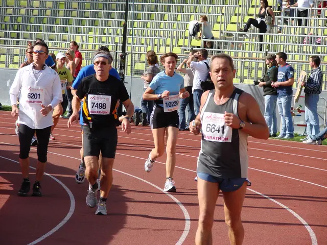 In this image I can see the group of people with different color dresses and I can see these people...