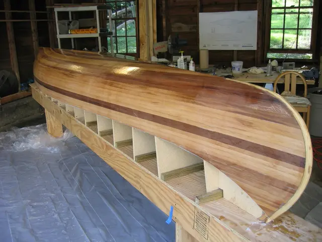 In this image there is a table on which there are bottles,papers on it. Beside the table there are...