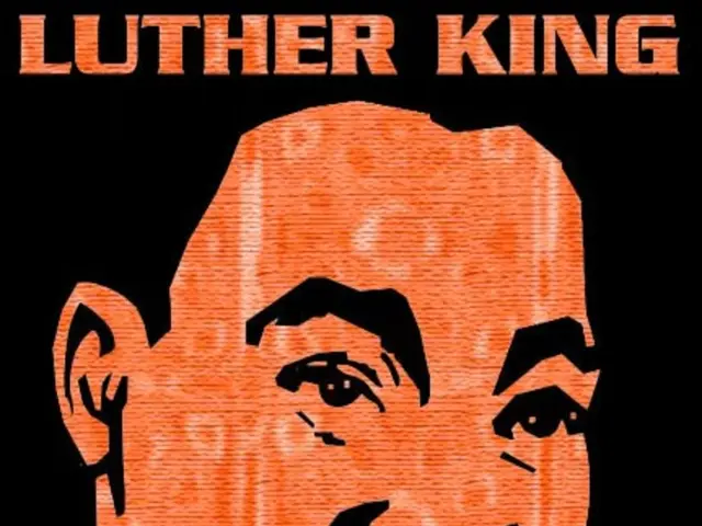 We can see poster of a person and something written on this poster.