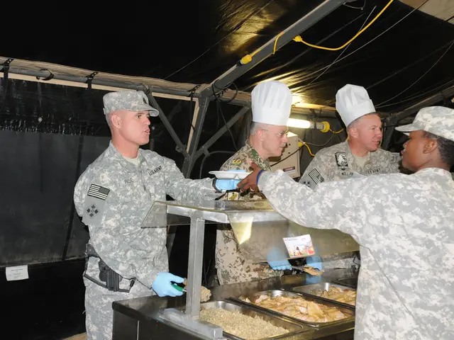 In this image we can see four people wearing a military dress. There is a food counter in which...