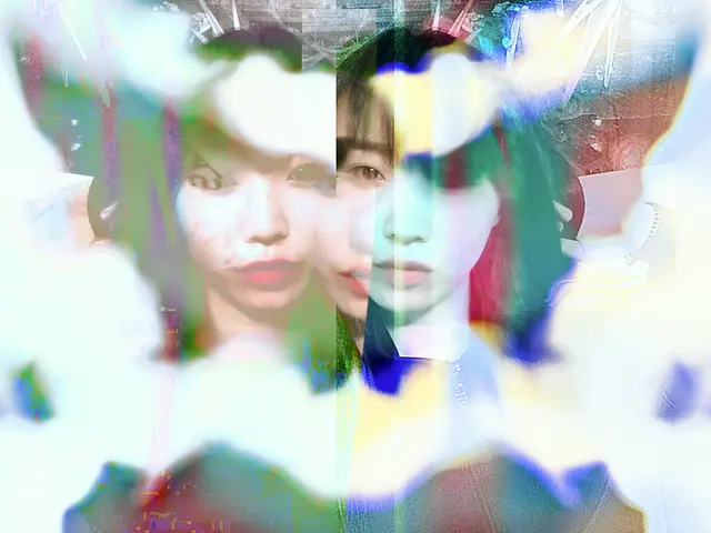 This is an edited picture. In the center of the picture there is a woman's face with reflections.