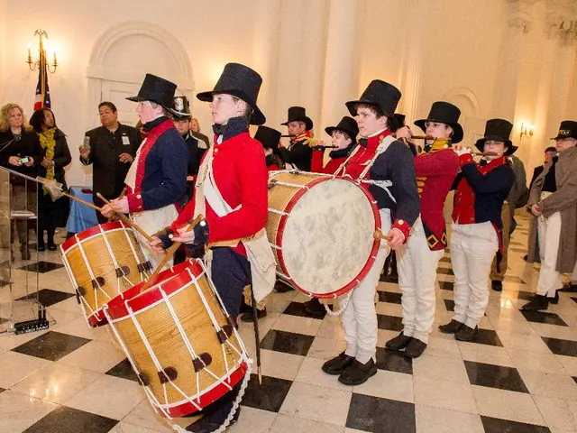 In this a band of people playing different type of instruments. Three of them playing drums and few...