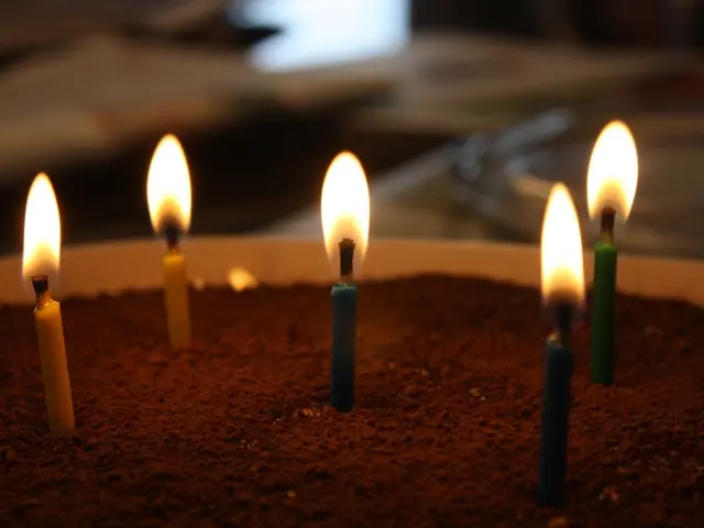 Here in this picture we can see candles, which are lightened up present over a place over there.