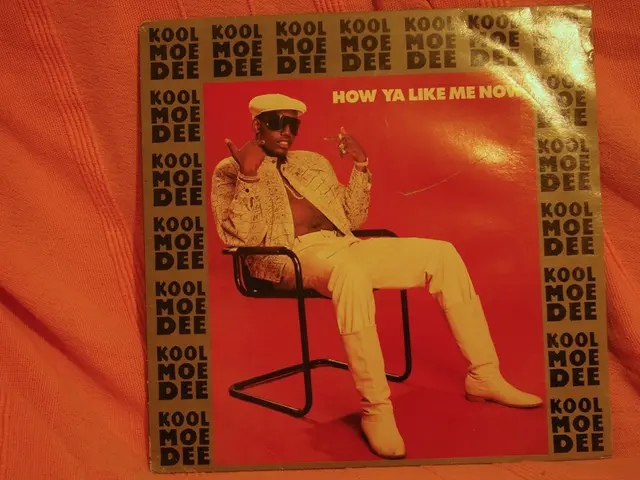 In this image there is a poster on that there is a man he wears jacket, trouser, cap and shoes he...