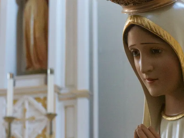 There is a statue on the right side of the image, it seems like, there is another statue and a...