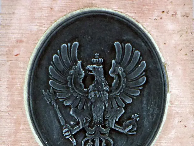 The image shows a close up of a book with a black and white logo on it. The logo is of Berlin,...