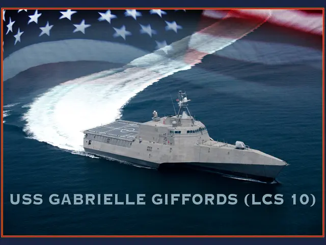 The image shows a navy ship, the USS Gabrielle Giffords LCS 10, sailing on the water with an...