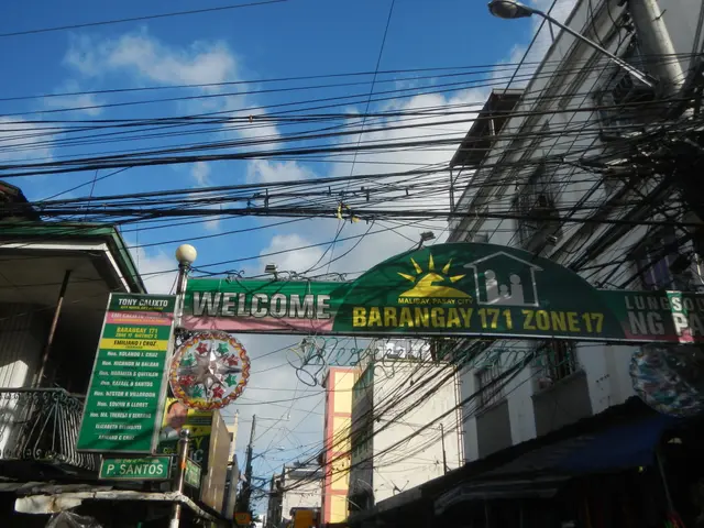 The image shows a bustling street in Manila, Philippines, with buildings, street poles, street...