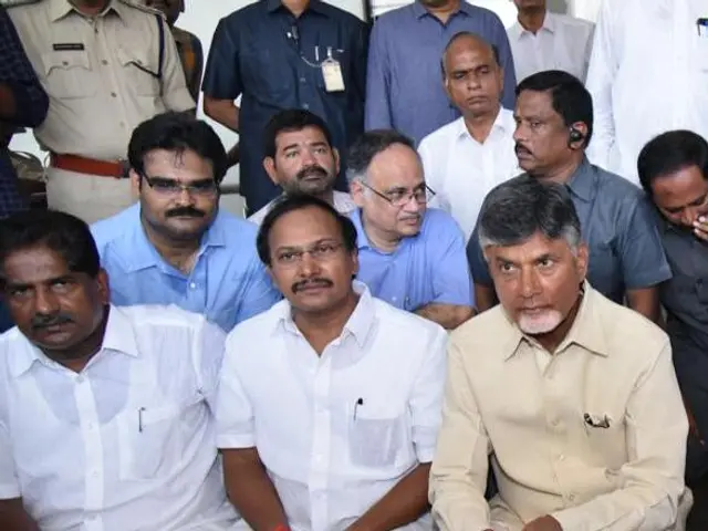 The image shows Andhra Pradesh Chief Minister Chandrababu Naidu and his cabinet meeting in...