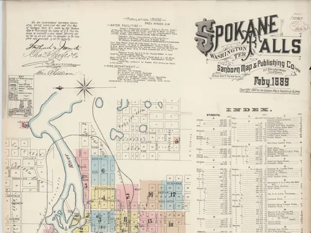 The image shows an old map of Spokane Falls, Washington from 1889. It is a detailed map with text...