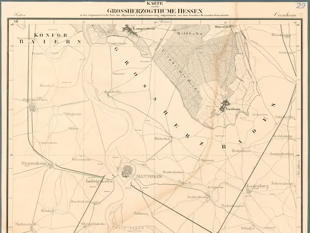 The image shows an old map of the city of Hessen, Germany, with a black border around it. The map...
