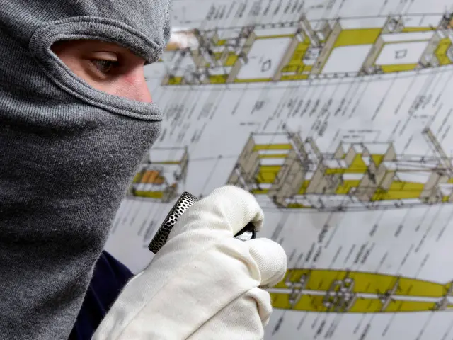 The image shows a man wearing a balaclava and gloves, holding an object in his hand, standing in...