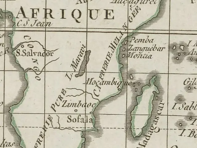 The image shows an old map of Africa with the provinces of South Africa highlighted. The paper has...