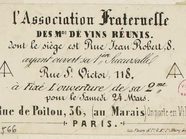 The image shows a piece of paper with text written on it and a stamp on the right side. The text...