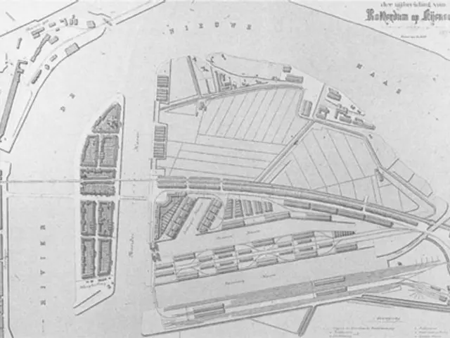 The image shows a black and white drawing of a plan of a city with a lot of buildings, which is...