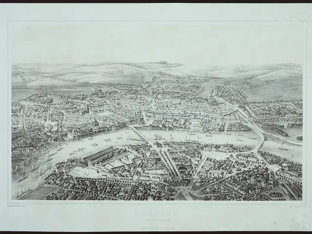 The image shows an aerial view of the city of Dresden, Germany. It is a black and white picture...