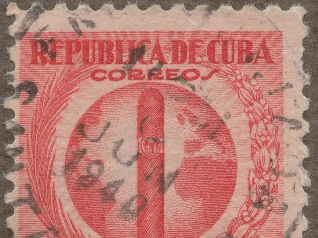 The image shows a stamp from Cuba with a red and black design on it. The text on the stamp reads...