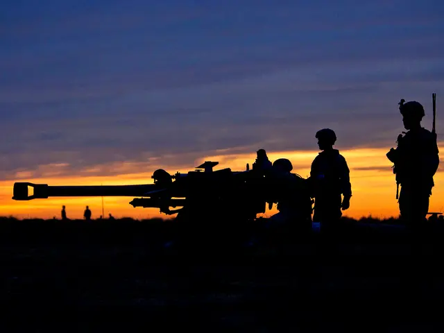 The image shows a group of soldiers standing next to each other in a field, with a machine gun in...