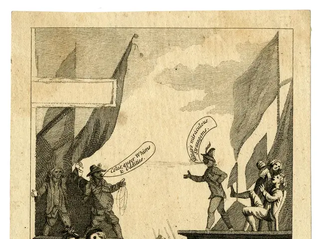 The image shows a group of people gathered around a table, with flags waving in the background. At...