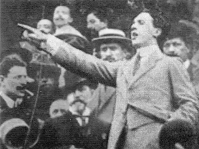 The image shows a black and white photo of a man in a suit pointing at something, surrounded by a...