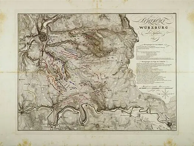 The image shows an old map of the city of Wurzburg, Germany, with text written on it. The map is...