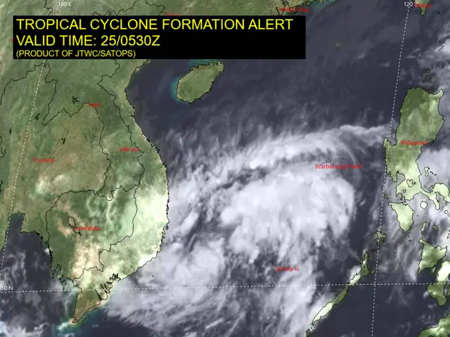 The image shows a satellite view of a tropical cyclone formation alert in the Philippines, with a...