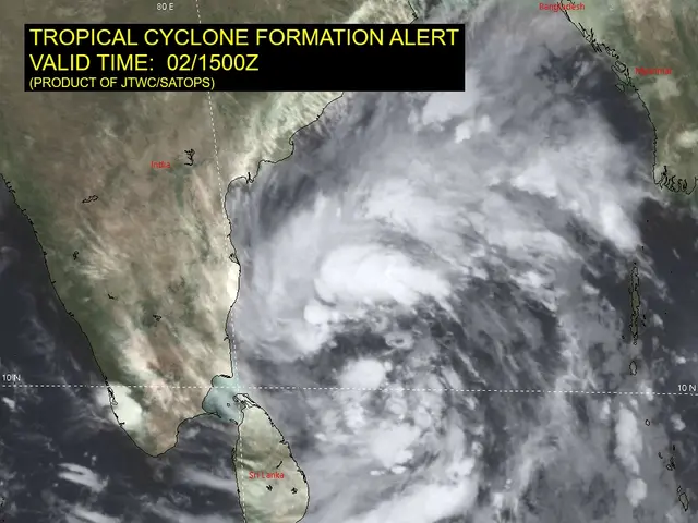 The image shows a satellite view of a tropical cyclone formation alert, with a map of India visible...