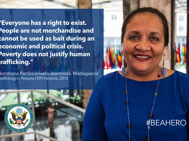 The image shows a woman in a blue dress standing in front of a building with a quote on it that...