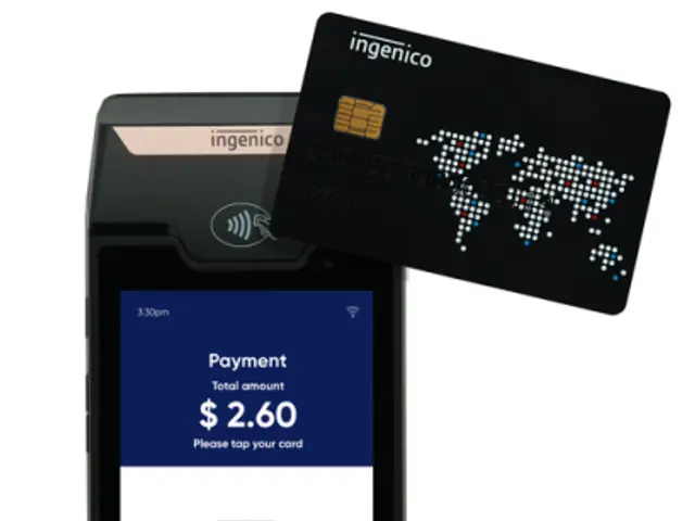 The image shows a mobile phone with a credit card next to it, indicating that it is an ingenico...