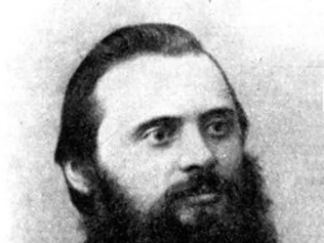 The image shows a black and white photo of six men with long beards, all of whom are believed to be...