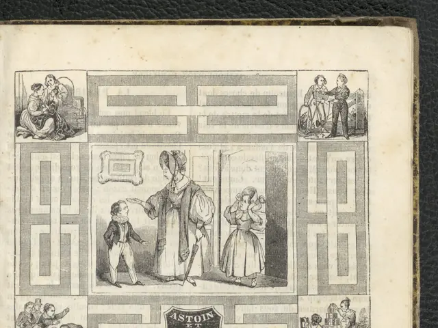 The image shows an open book with a drawing of a family on it, placed on a black surface. The book...