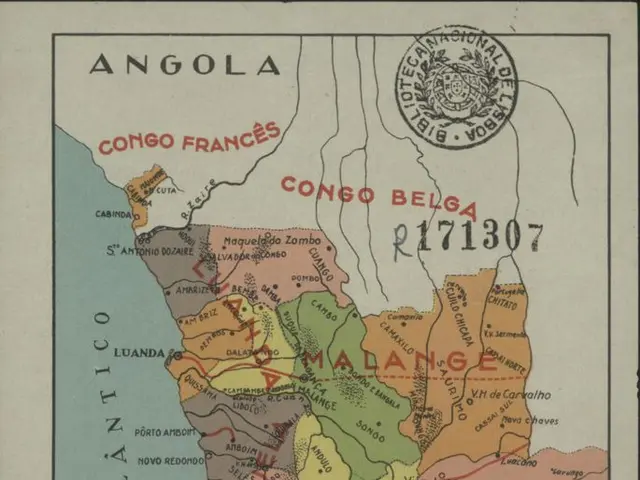 The image shows a poster with a map of Angola, featuring text and a stamp. The map is detailed and...