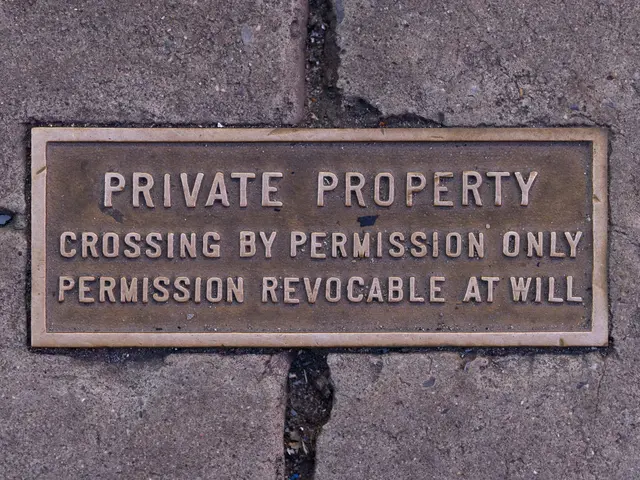 The image shows a plaque on the sidewalk that reads "Private Property Crossing by Permission Only"....