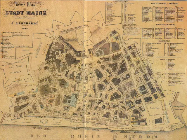 The image shows an old map of the city of Stadt Mainz, Germany, with text on the paper. The map is...