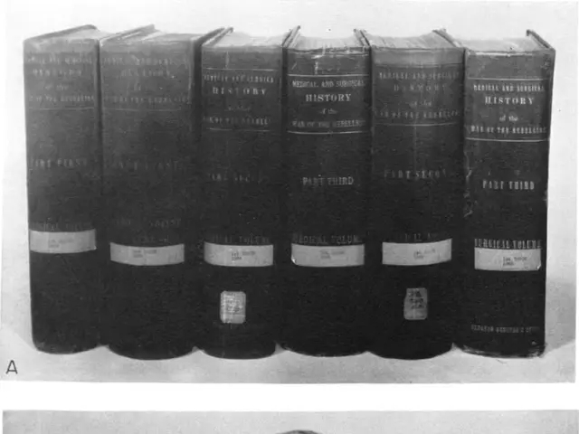 The image shows a black and white photo of a man with a gun in his hand, surrounded by books at the...