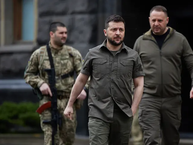 The image shows a man in a military uniform being escorted by two men in military uniforms, one of...