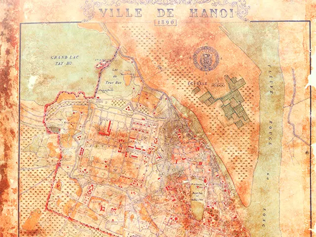 The image shows an old map of the city of Hanoi, Vietnam, with text at the top and bottom of the...