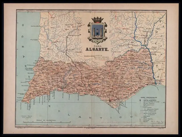 The image shows an old map of Algarve, Portugal, framed in a photo frame. The map features text and...