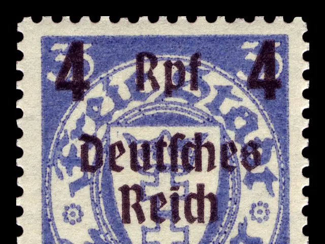 The image shows a blue and white stamp with the words "Deutsches Reich" on it against a black...