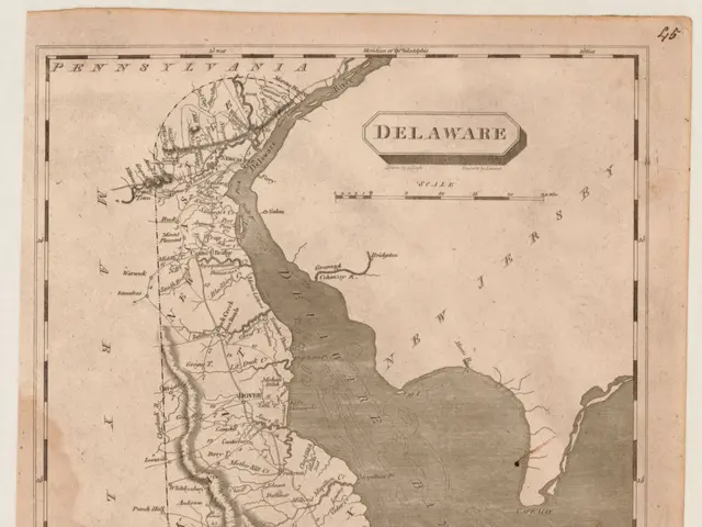 The image shows an old map of the state of Delaware, with text written on it. The map is detailed,...