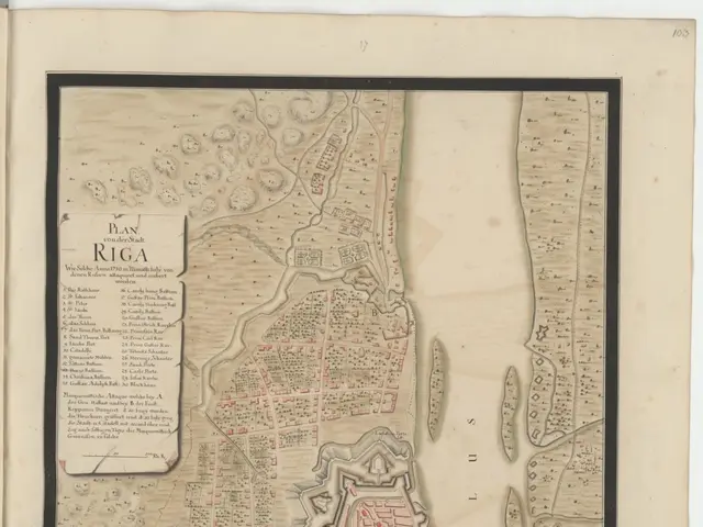 The image shows an old map of the city of Riga, Latvia, with text on the paper. The map is detailed...